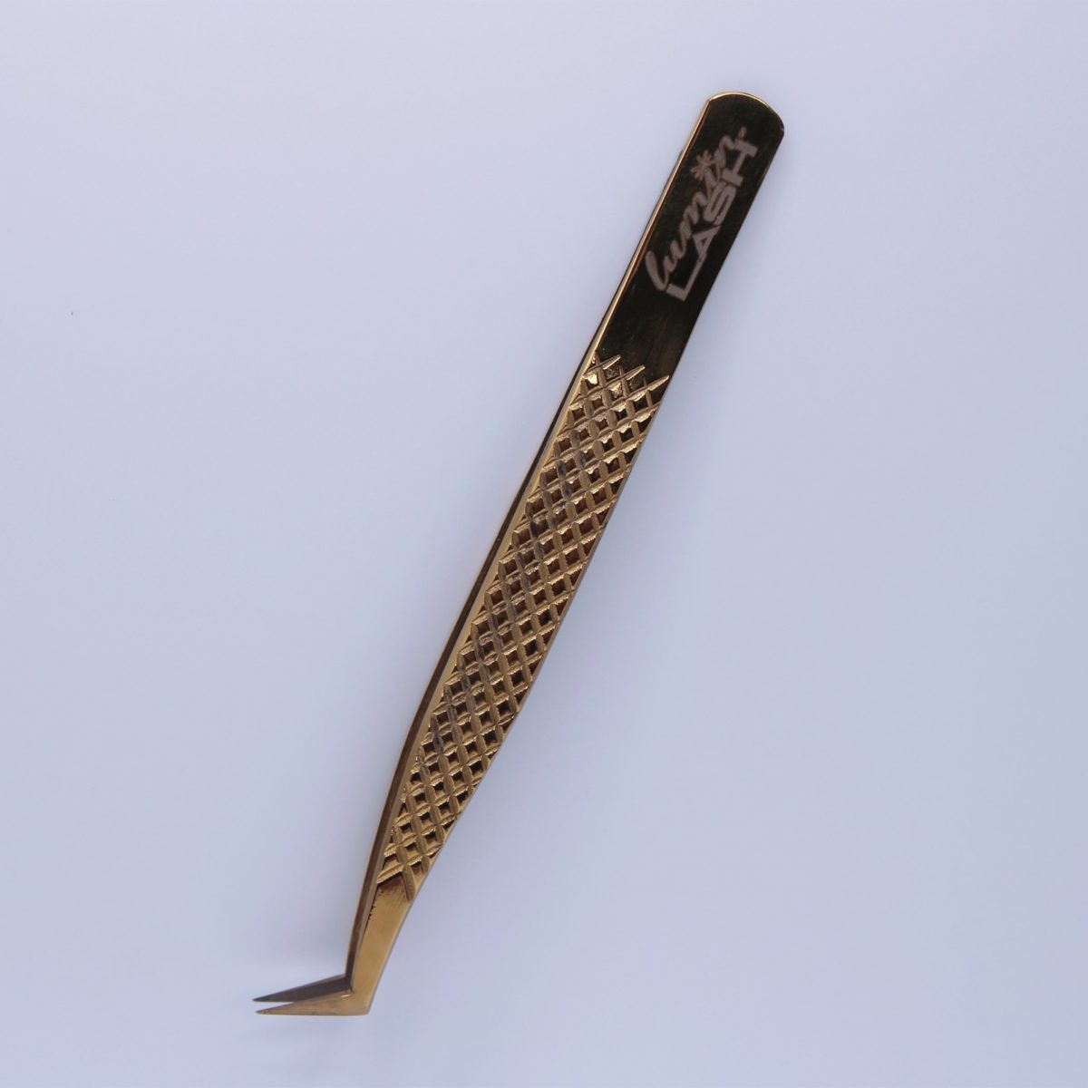 Volume-Diamond Gold Fiber Tip Tweezer